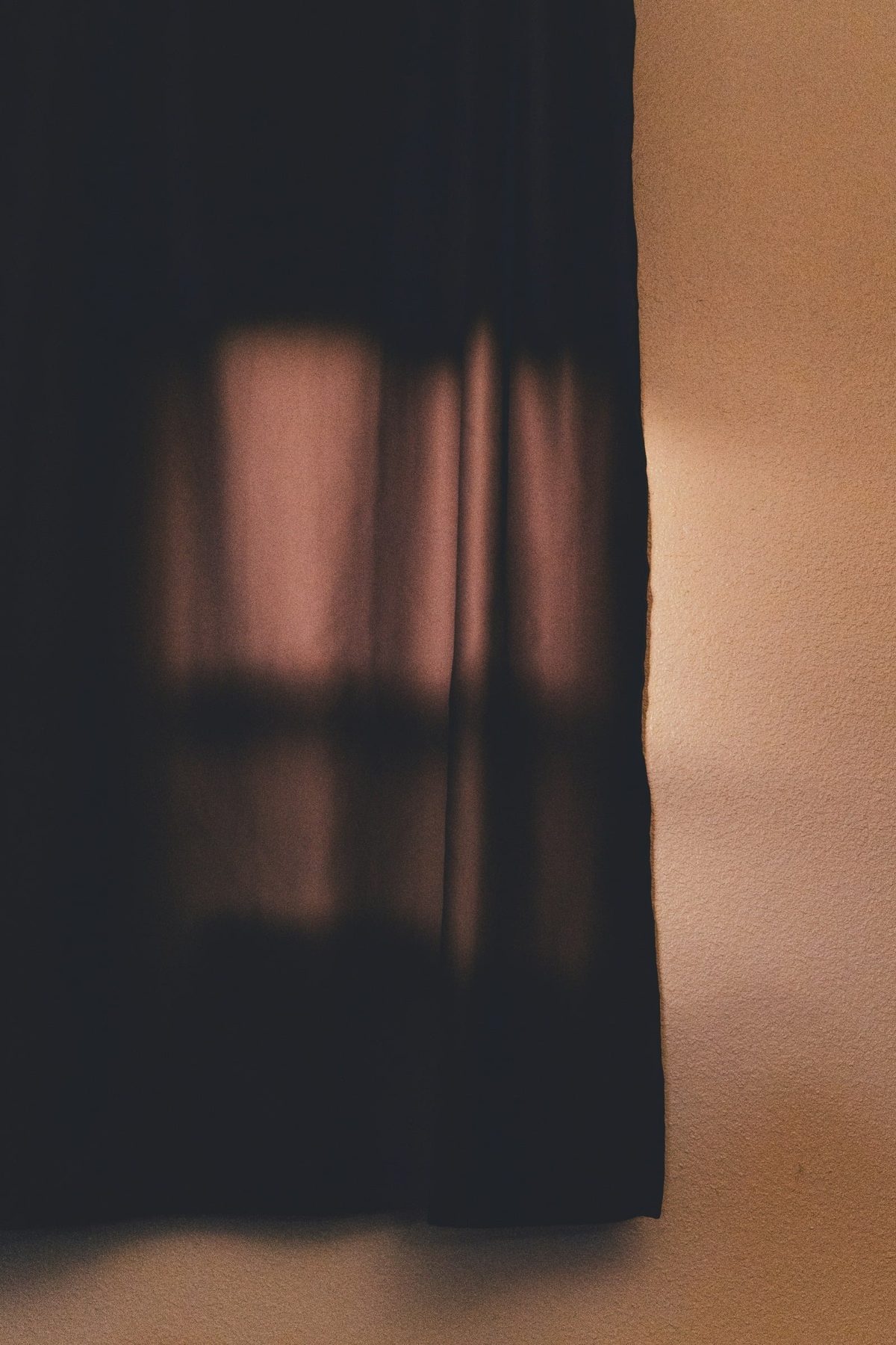 Warm light through a curtain